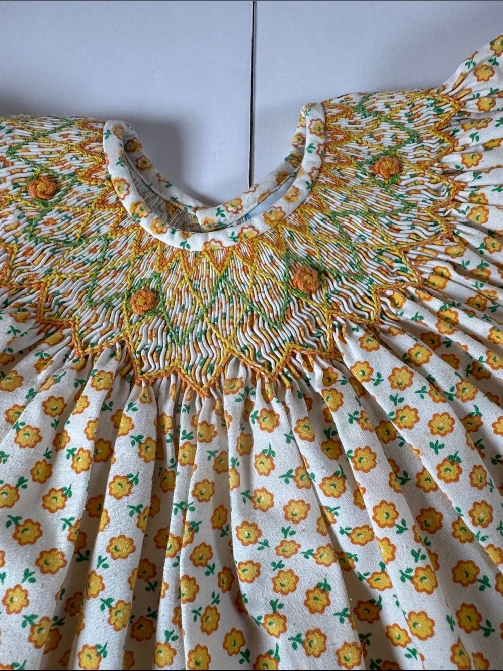 Remember hguyen White and Yellow Floral Smocked Flutter dress